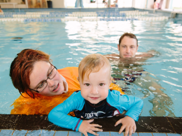 Child learning to swim resized